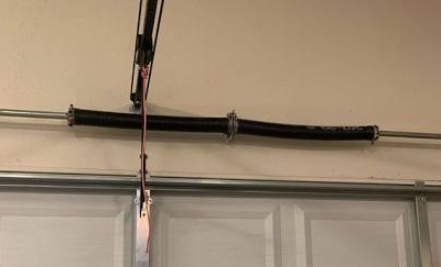 Why a Balanced Garage Door Prevents Costly Repairs